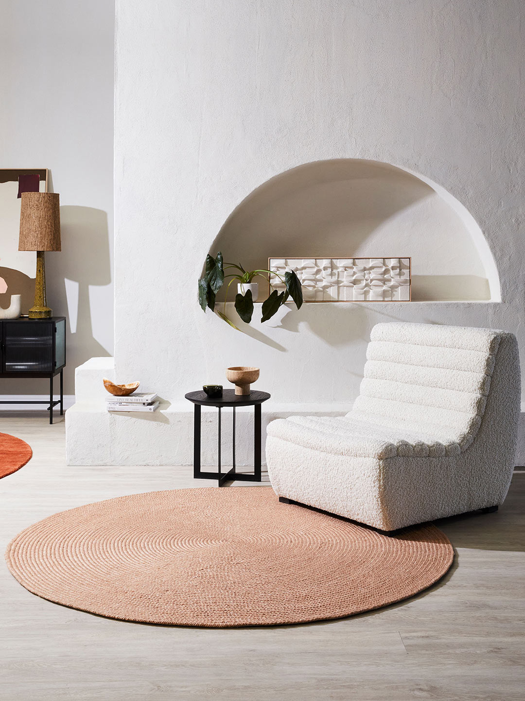 Round Paddington Clay rug by India, pink and peach wool with viscose accents, showcasing soft textures and vibrant colors.