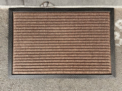 Brown Doorkeeper doormat made of coir and rubber by India, ideal for outdoor entryways and durable door decor.