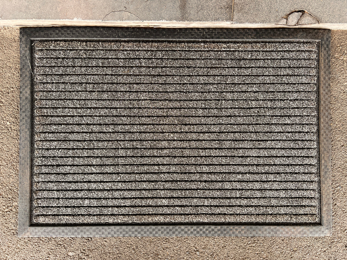 Coir and rubber Doorkeeper doormats with India branding, featuring a durable, textured surface ideal for outdoor entryways.