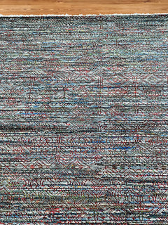 India Grass Multi rug, 246 x 305 cm, made of pure wool and sari silk, showcasing vibrant, intricate woven patterns.