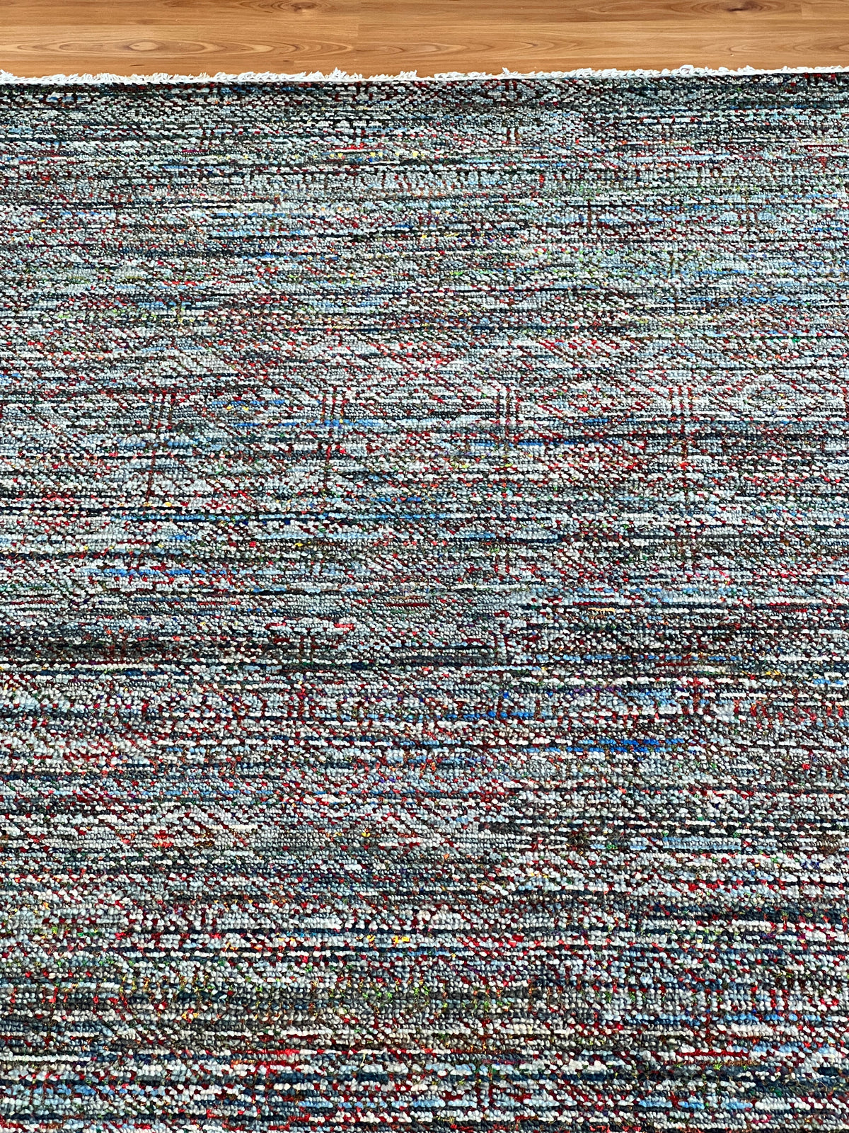 India Grass Multi rug, 246 x 305 cm, made of pure wool and sari silk, showcasing vibrant, intricate woven patterns.