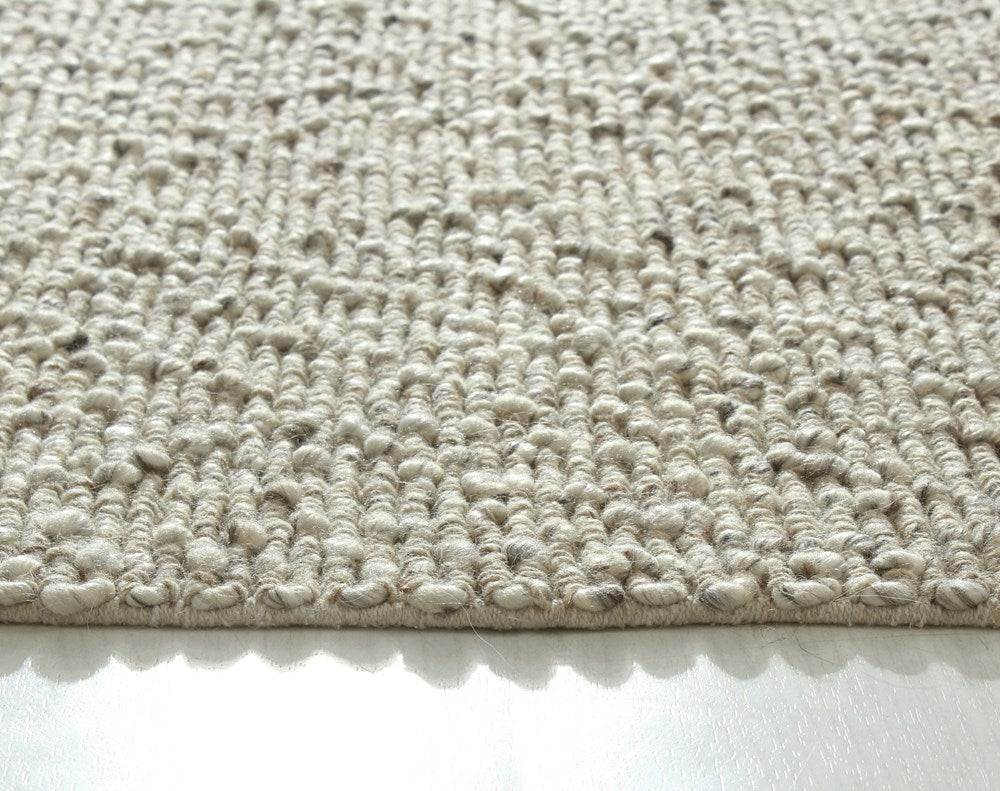 Itsy Bitsy beige and brown polyester, wool, and cotton fabric from India, showcasing a soft, textured material.