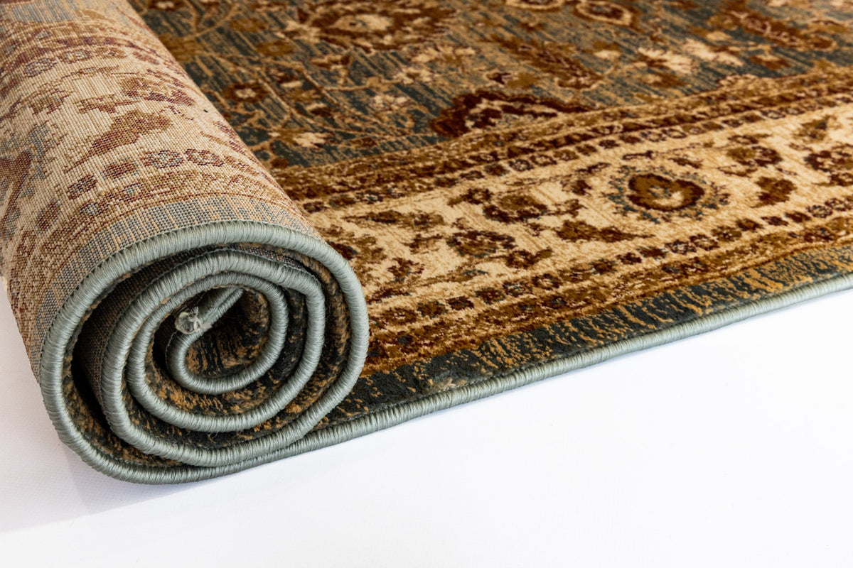 Antique blue Verona heat set polypropylene rug with Turkish craftsmanship, showcasing intricate patterns and soft texture.