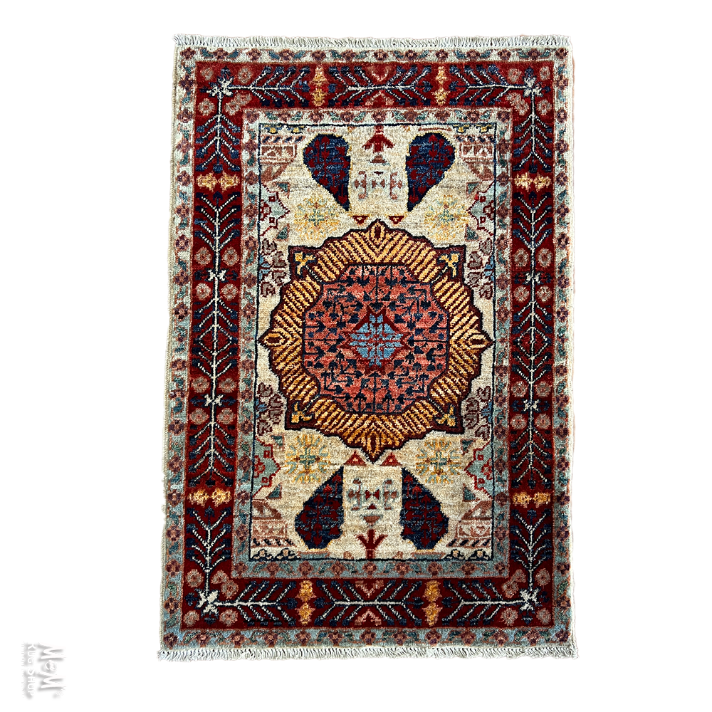Decorative rug with intricate patterns on a white background