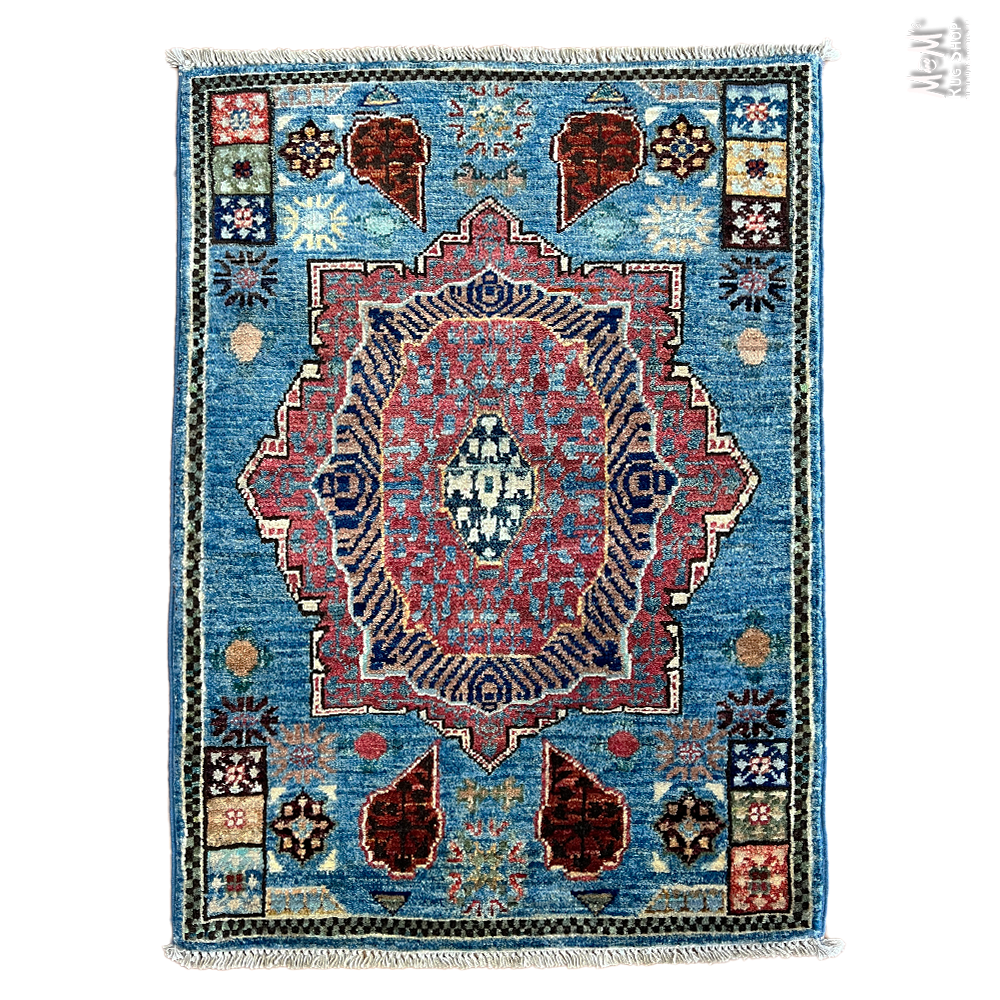 Decorative rug with geometric pattern on a white background