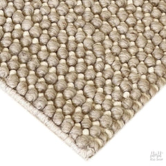 India Dalton Oatmeal wool blend fabric with viscose, showing a close-up of the textured oatmeal-colored textile.