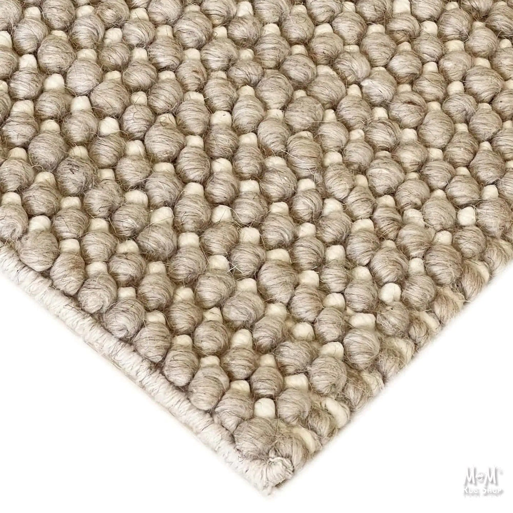 India Dalton Oatmeal wool blend fabric with viscose, showing a close-up of the textured oatmeal-colored textile.