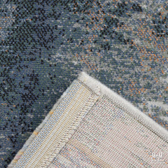 Belgium Franklin Evergreen heat set polypropylene fabric roll with green patterned design, shown in close-up view.