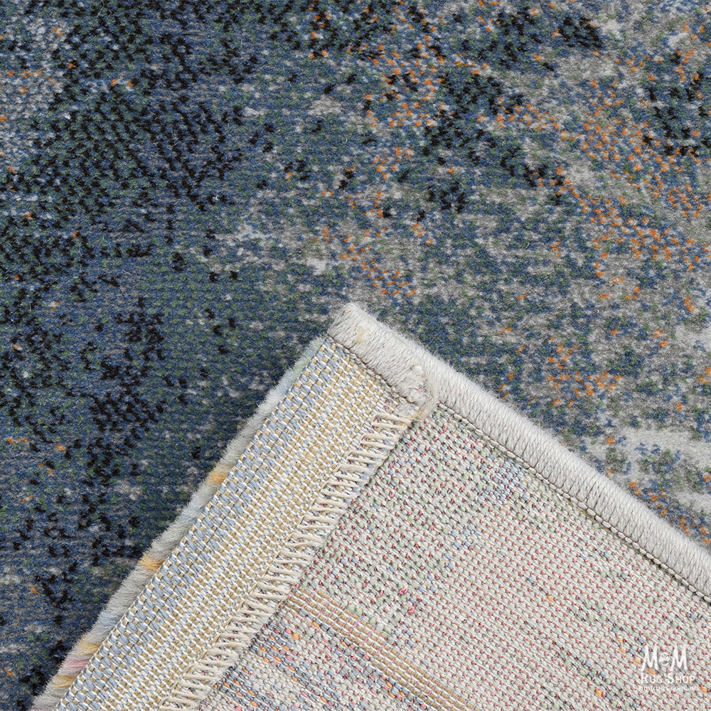 Belgium Franklin Evergreen heat set polypropylene fabric roll with green patterned design, shown in close-up view.