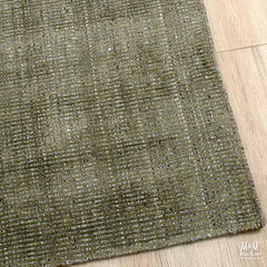India Garcia Olive wool and viscose rug with green and beige patterns, soft texture, and intricate design.