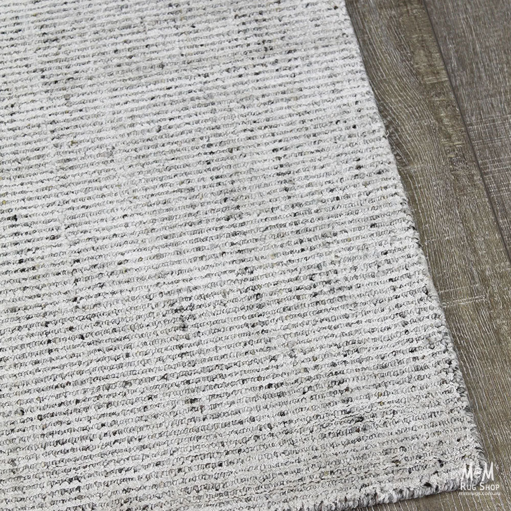 India Garcia Oyster wool and viscose rug with intricate pattern, soft texture, and elegant design in warm neutral tones.