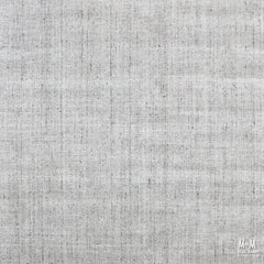 Wool and viscose Garcia Oyster rug with intricate patterns, showcasing rich textures and earthy tones, from India.