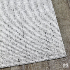 India Garcia Whisper wool and viscose rug with intricate pattern and soft, textured surface.