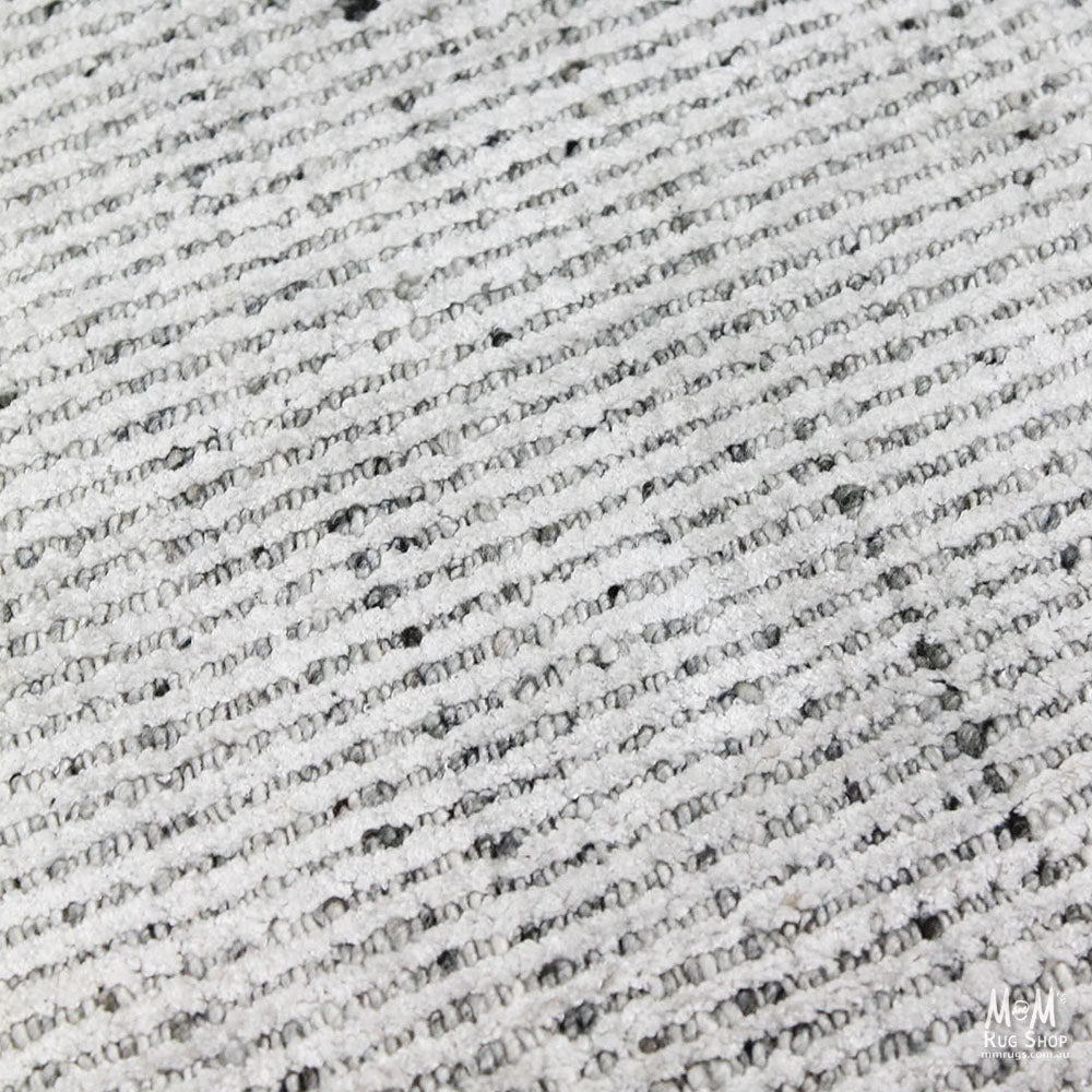 India Garcia Whisper wool and viscose rug with intricate pattern in neutral tones, showcasing soft texture and elegant design.