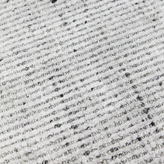 India Garcia Whisper wool and viscose rug with intricate pattern in neutral tones, showcasing soft texture and elegant design.