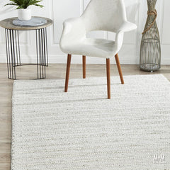Close-up of Harvest Ivory wool with viscose fabric showcasing its soft, textured surface in natural ivory color.