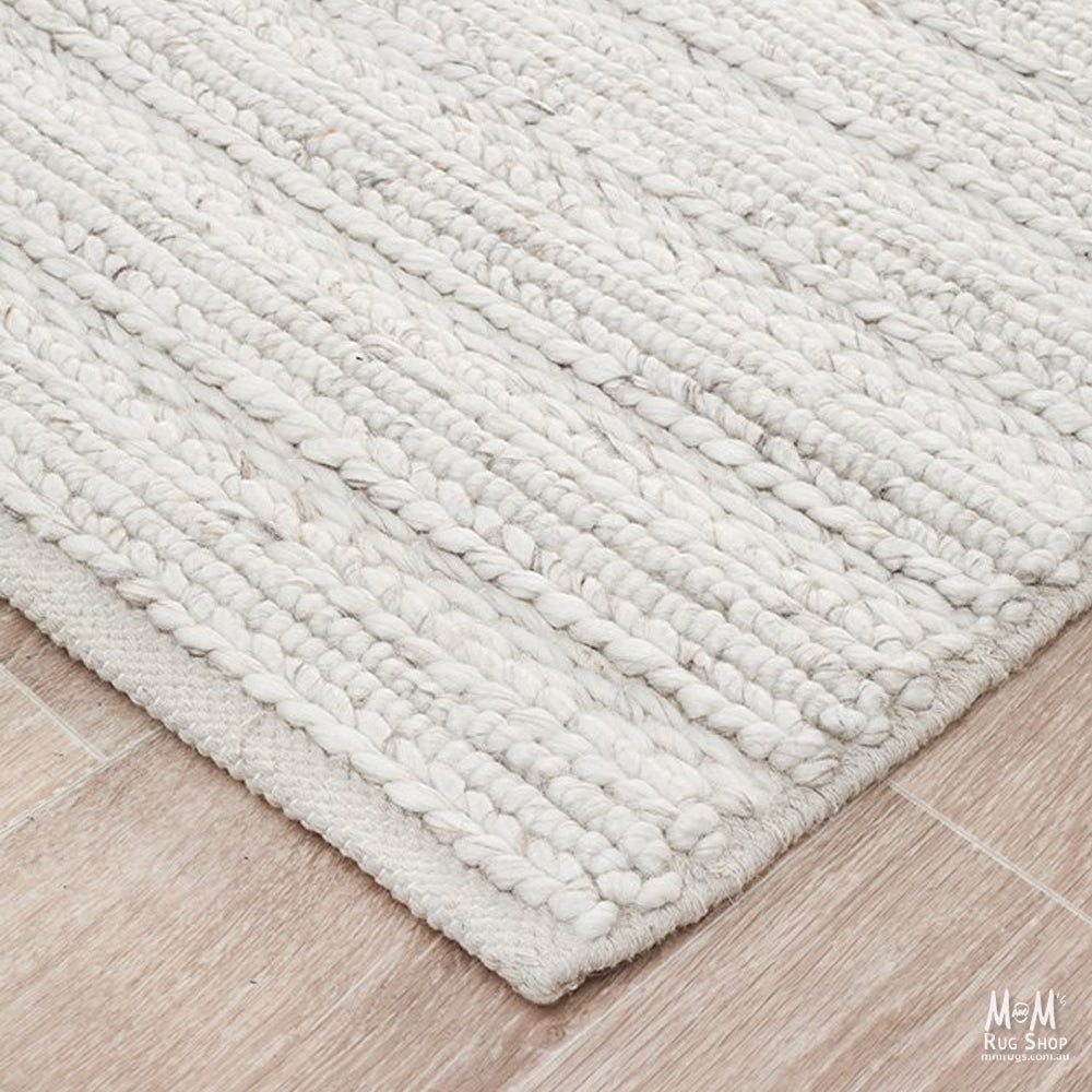 Soft ivory wool with viscose blend fabric, showcasing a smooth, luxurious texture from India.