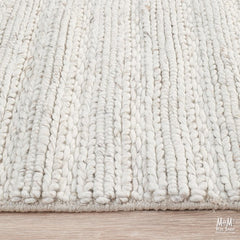 Cream-colored Harvest Ivory wool and viscose blend fabric from India, showcasing a soft, textured textile with subtle sheen.