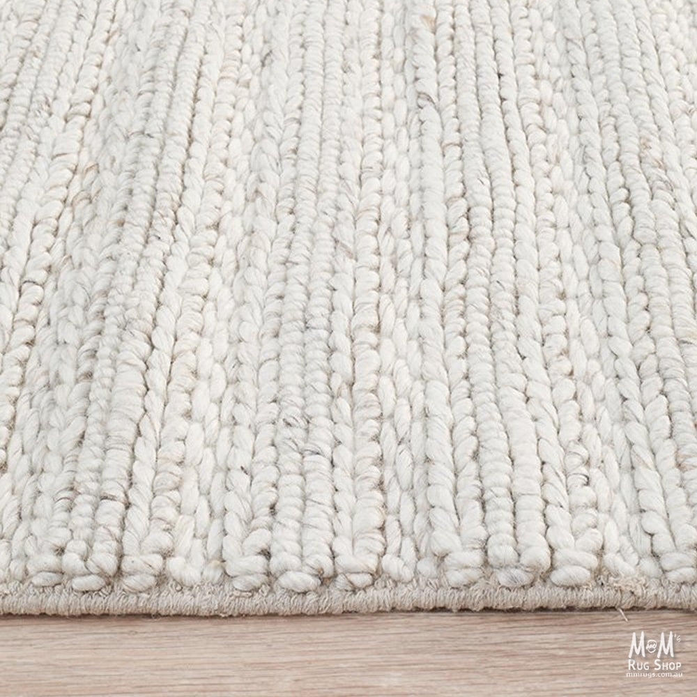 Cream-colored Harvest Ivory wool and viscose blend fabric from India, showcasing a soft, textured textile with subtle sheen.