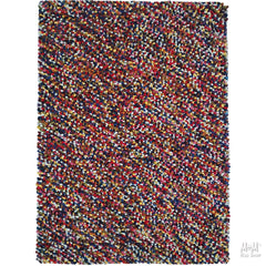 Colorful wool and cotton Jelly Bean Multi from India, showing a vibrant, textured fabric with multicolored jellybean patterns.