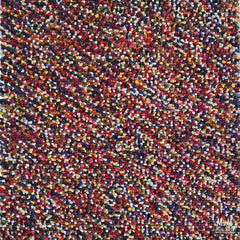 Colorful wool and cotton Jelly Bean Multi yarn skein from India, showcasing vibrant multicolor jellybean-like strands.
