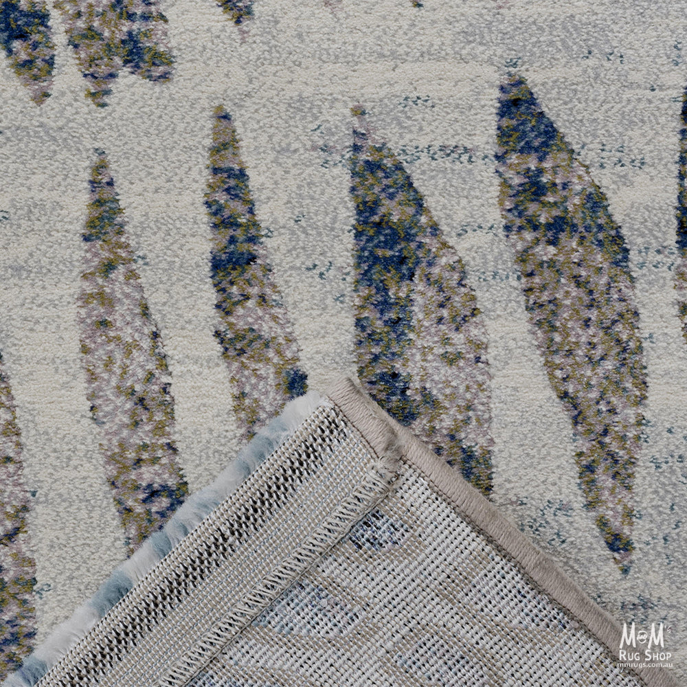 Belgium Kensington Chronicle heat set polypropylene rug with intricate pattern and warm tones, ideal for modern living spaces.