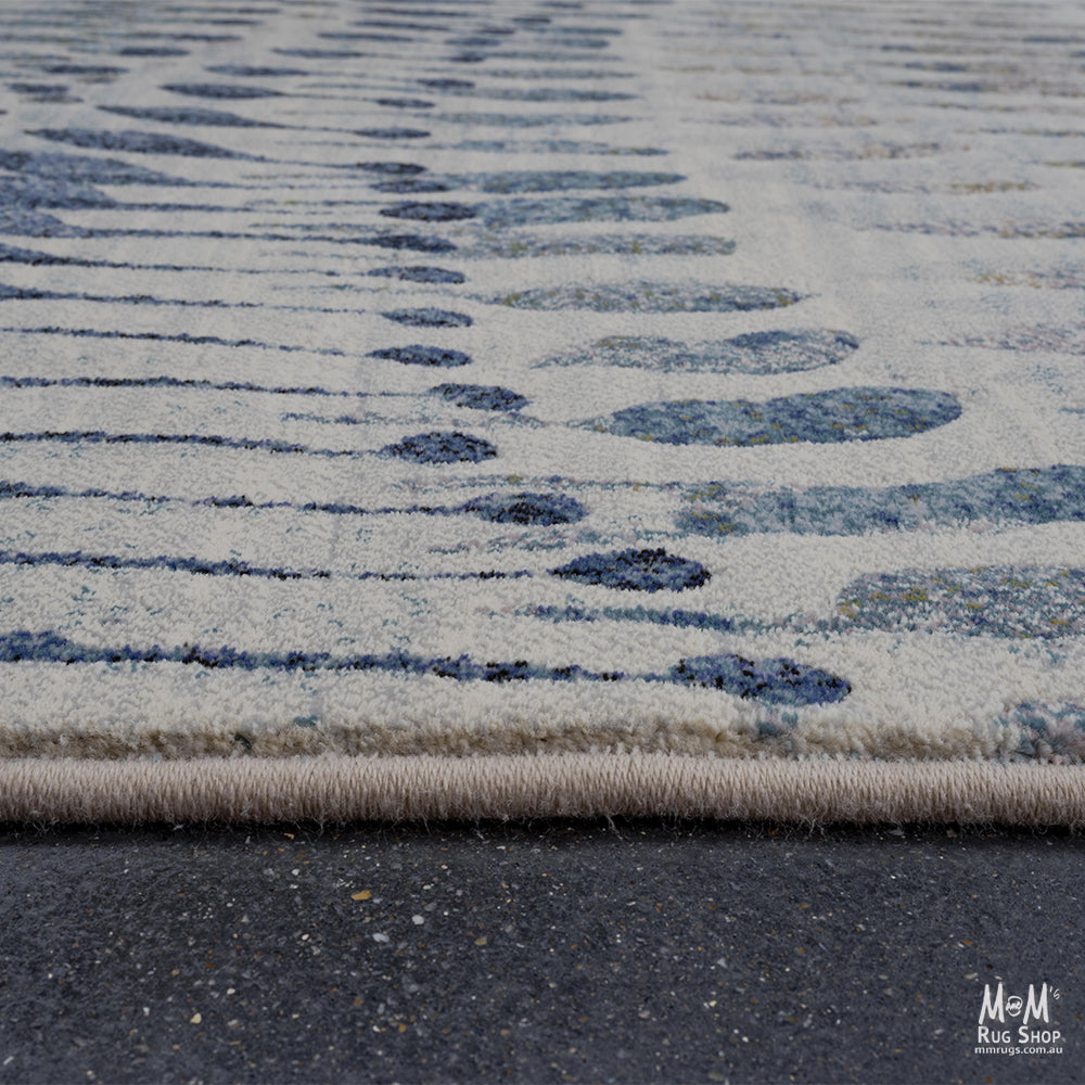 Belgium Kensington Chronicle heat set polypropylene rug with intricate pattern and rich colors, perfect for living room decor.