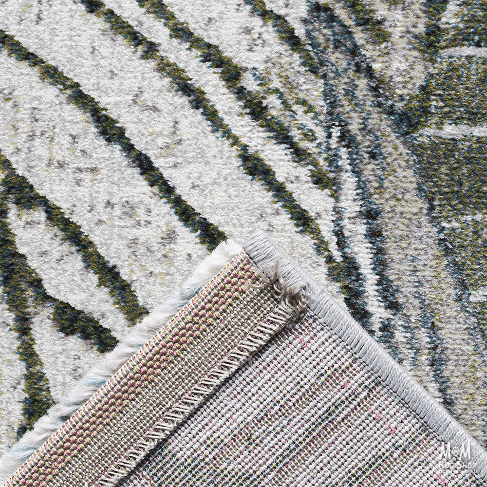 Belgium Kensington Tropic heat set polypropylene rug with vibrant tropical pattern and textured surface, perfect for modern interior decor.