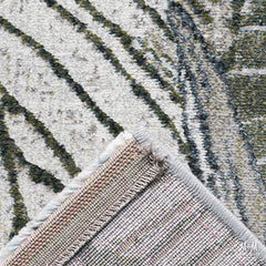 Belgium Kensington Tropic heat set polypropylene rug with vibrant tropical pattern and textured surface, perfect for modern interior decor.