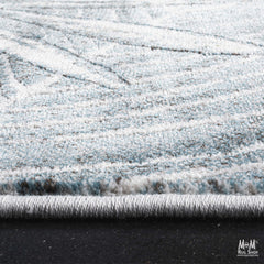 Belgium Kensington Tropic heat set polypropylene rug with tropical pattern, textured surface, and vibrant colors.