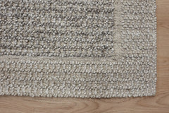India Liberty Walnut recycled P.E.T. rug featuring a detailed walnut pattern on a neutral background, showcasing eco-friendly textile design.
