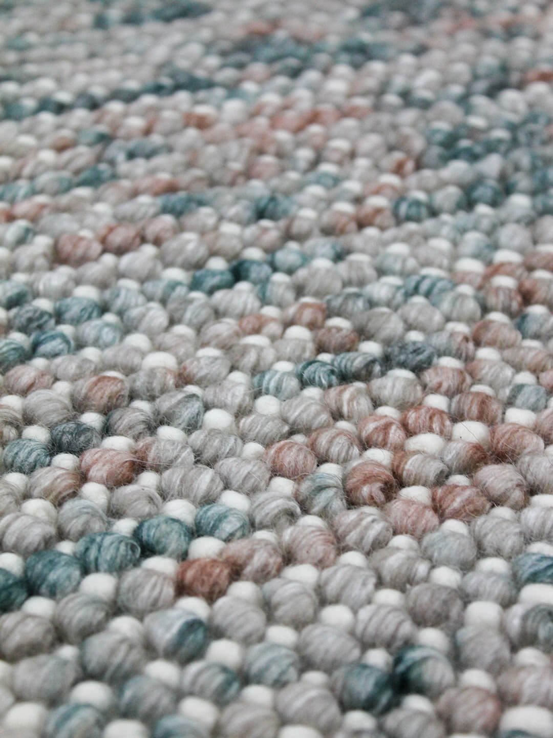 Close-up of the Magic Oasis wool and viscose rug from India, showcasing intricate patterns and rich textures.