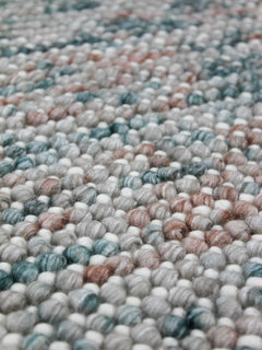 Close-up of the Magic Oasis wool and viscose rug from India, showcasing intricate patterns and rich textures.