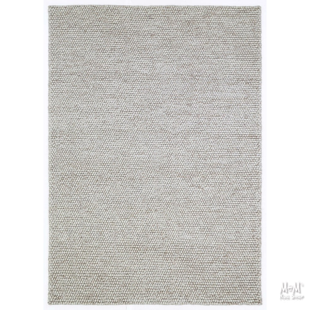 Wool and cotton Nirvana Chalk from India, shown in a natural, textured ball for artistic or writing use.