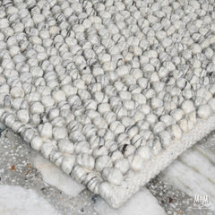 Ovation Oyster wool and cotton blend fabric swatch showing soft, textured material in natural tones.