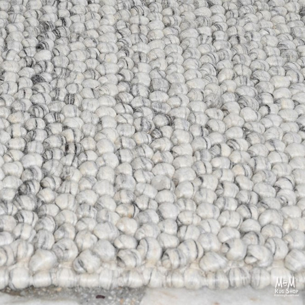 Ovation Oyster wool and cotton blend fabric sample from India, showing a textured, natural-colored textile with soft, woven appearance.