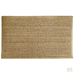 Portsea Beige sisal and polypropylene rug by India, showing a textured beige area with intricate woven patterns.