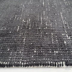 Close-up of Rihanna Galaxy wool and viscose fabric showcasing its textured, multicolor galaxy-inspired pattern.