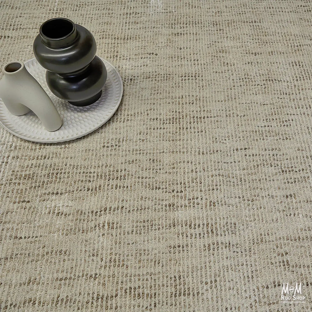 Toro Beige wool fabric with viscose from India, showcasing a soft, textured beige textile material for clothing or home decor.