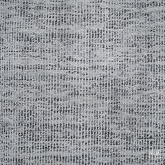 Close-up of Toro Silver wool with viscose fabric showing its soft texture and silver sheen, crafted by India.