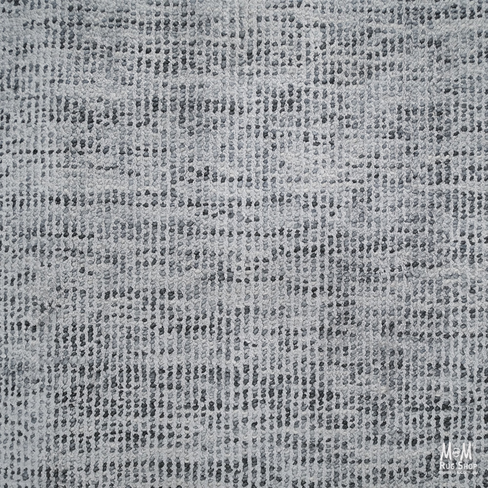 Close-up of Toro Silver wool with viscose fabric showing its soft texture and silver sheen, crafted by India.