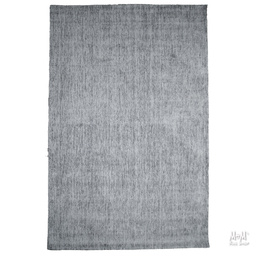 Close-up of Toro Silver wool and viscose fabric by India, showing its soft texture and elegant silver sheen.