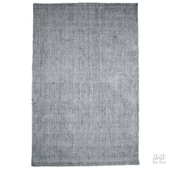 Close-up of Toro Silver wool and viscose fabric by India, showing its soft texture and elegant silver sheen.