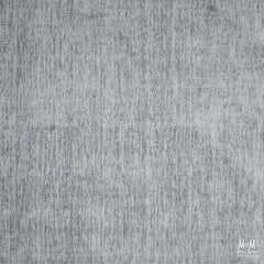 Close-up of Toro Silver wool and viscose fabric by India, showcasing its smooth texture and elegant silver sheen.