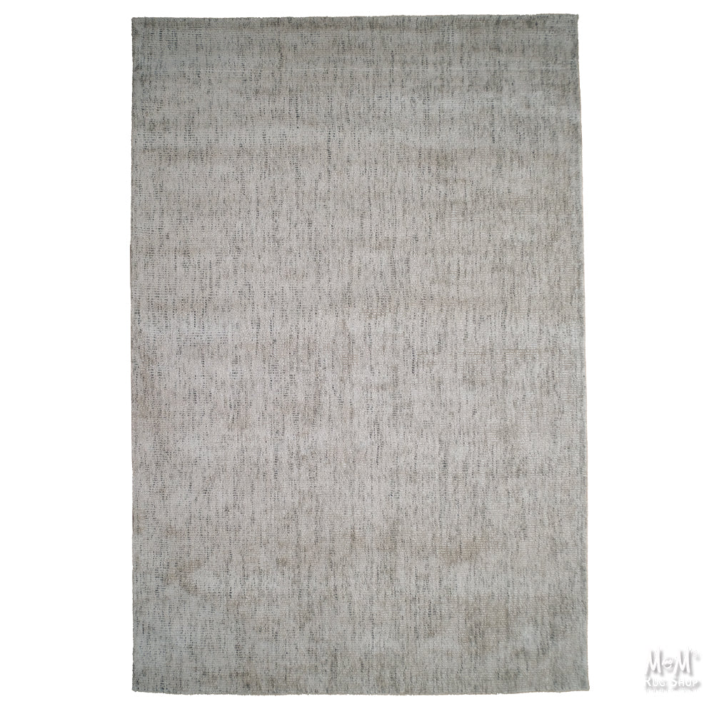 India Toro Taupe wool and viscose fabric swatch showing soft taupe color and textured surface.