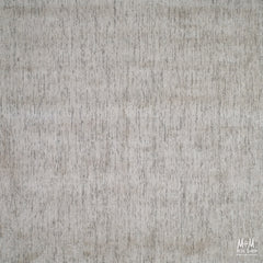 India Toro Taupe wool and viscose fabric, close-up of soft, textured material in taupe color, showcasing luxurious textile details.