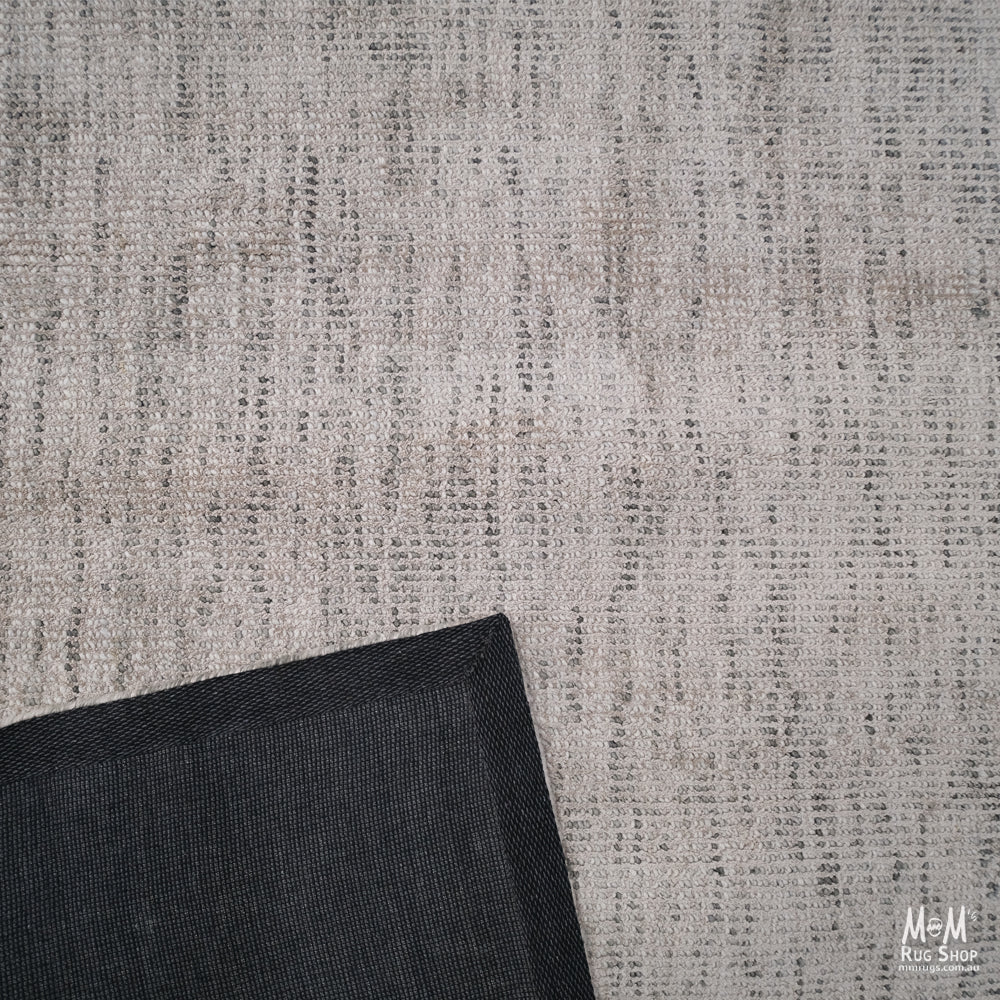 India Toro Taupe wool and viscose fabric, showing a soft textured taupe-colored textile with subtle sheen.