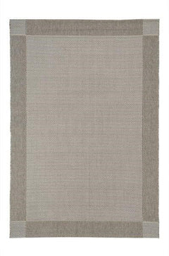 Grey polypropylene Verandah rug by Belgium, showcasing a soft, textured surface with subtle cream accents on a neutral floor.