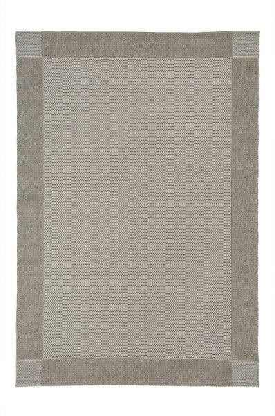 Grey polypropylene Verandah rug by Belgium, showcasing a soft, textured surface with subtle cream accents on a neutral floor.