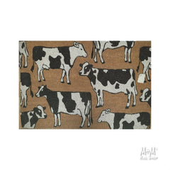 PVC coir doormat featuring dairy cows design, available in various sizes, from M and M's Rug Shop.